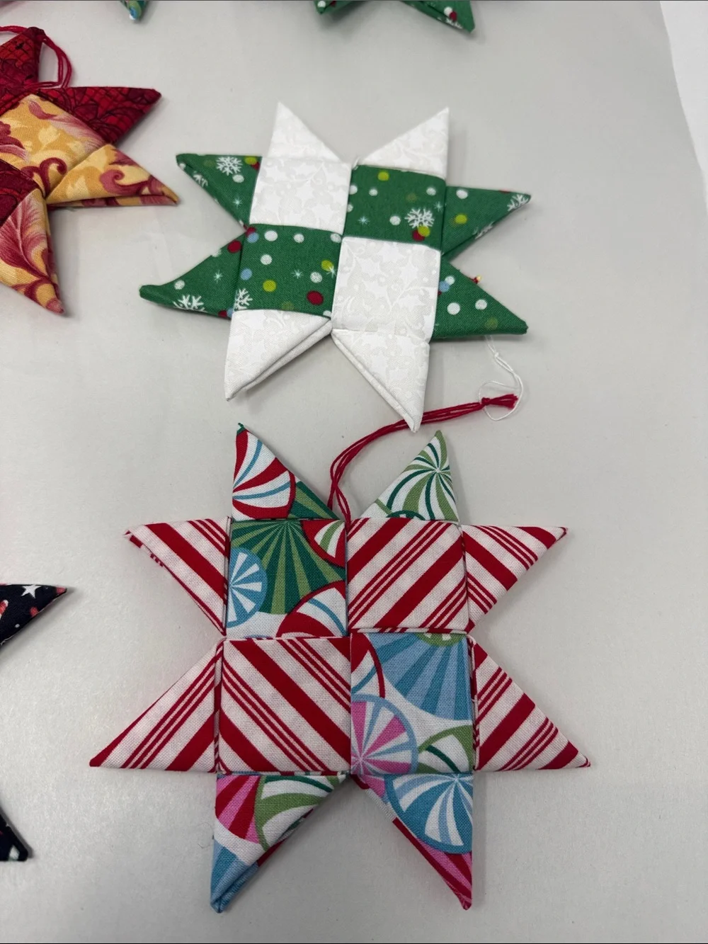 HANDMADE FOLDED FABRIC FOLDED STARS CHRISTMAS ORNAMENTS QUILT LOT OF 11 BOHO